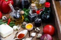 Various spices, oils and sauces selection on wooden background