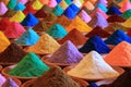 Various spices selection. multicolored powder dyes in a market