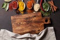 Various spices spoons on stone table Royalty Free Stock Photo