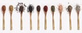 Various spices spoons on white table. Top view with copy space. Royalty Free Stock Photo