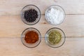 various spices on wooden table