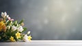 various spring flowers on table with bokeh copy space