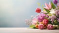 various spring flowers on table with copy space