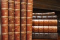 Various stacks of antique books