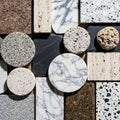 Various stone samples, including granite, marble, terrazzo, and Royalty Free Stock Photo