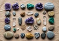 Of various stones and crystals arranged neatly on a textured brown Royalty Free Stock Photo