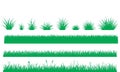 Various stylized green grass tufts and borders against white background Royalty Free Stock Photo
