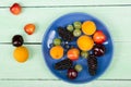 Various summer Fresh berries in a bowl on rustic wooden table. .Antioxidants, detox diet, organic fruits. Top view Royalty Free Stock Photo