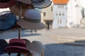 Various summer hats on stand in different sizes and forms Royalty Free Stock Photo