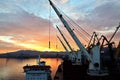 Various sunrise views of the piers, terminal and coastline of the Port of Vostochnyy. Russia, December,2020