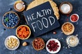 Various super foods in bowls on table. Healthy food, healthy living Royalty Free Stock Photo