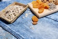 Various superfoods. Healthy food.Nuts, dried fruits and muesli. Close up. Small elements -seeds, almonds, fruit. Top view, Copy sp Royalty Free Stock Photo