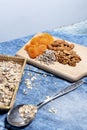Various superfoods. Healthy food.Nuts, dried fruits and muesli. Close up. Small elements -seeds, almonds, fruit Royalty Free Stock Photo
