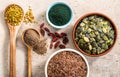 Various superfoods on kitchen table Royalty Free Stock Photo