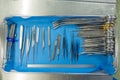 Various sorted surgical instruments in a tray