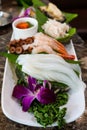 various sushi and sashimi on the ceramic plate Royalty Free Stock Photo
