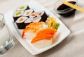 Various of sushi traditionally served with pickled ginger, wasabi and soy sauce. Japanese cuisine Royalty Free Stock Photo