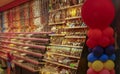 Various sweets and snacks on the shelves. Interior of a sweet shop