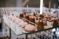 Various sweets on the table. Eclairs, cakes, candies Royalty Free Stock Photo