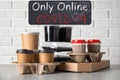 Various takeout containers. Online food delivery service