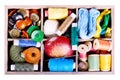 Various threads and sewing tools in box Royalty Free Stock Photo