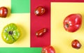 Various tomatoes on the multicolored geometric background