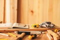 Various tools on carpentry woodwork workshop desk, selective focus Royalty Free Stock Photo