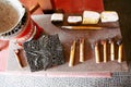 Various tools needed to make batik canting. A camp stove for heating the wax, cotton wax, silk wax, a metal mold, canting tools