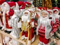 Various toy Santa Clauses are on the store shelf for sale Royalty Free Stock Photo