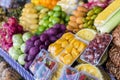 Various tropical fruits neatly arranged for sale at a public market in Tagaytay