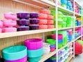 Various type and color plastic household products on supermarker shelf. Royalty Free Stock Photo