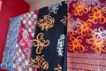 Various types of batik from Bontang, East Kalimantan, with a silver egret and mangrove motif