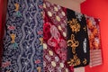 Various types of batik from Bontang, East Kalimantan, with a silver egret and mangrove motif