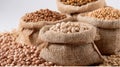 Various types of beans and legumes stored in rustic burlap sacks, a healthy source of protein Royalty Free Stock Photo