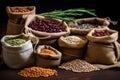 various types of beans in small burlap sacks Royalty Free Stock Photo