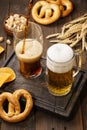 Various types of beer - light and dark and snack variety. Royalty Free Stock Photo