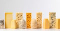 Various types of blue cheese, hard in a row. White background. AI generated.