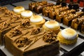 Various types of cakes, tart, mousse, pies for sale in bakery or pastry shop, gourmet luxury concept