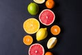 Various types of citrus fruit on a dark background Royalty Free Stock Photo