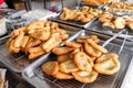 Various types of fried bread sticks or you tiao at hawker stall