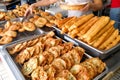 Various types of fried bread sticks or you tiao at hawker stall