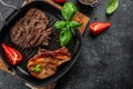 Various types of grilled meat, beef, pork in pan, banner, menu, recipe place for text, top view Royalty Free Stock Photo