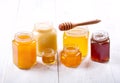 Various types of honey in glass jars Royalty Free Stock Photo