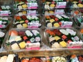 Various types of Japanese sushi ready in packs are on display for sale. Royalty Free Stock Photo