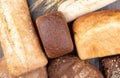 Various types of loaves of wheat and rye bread. Food background Royalty Free Stock Photo