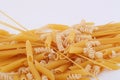 Various types of pasta on a white background. Royalty Free Stock Photo