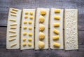 Various types of pasta on lasagne sheets Royalty Free Stock Photo