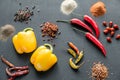 Various types of pepper on the dark wooden background Royalty Free Stock Photo