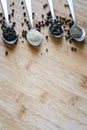 Various types of pepper on a wooden background Royalty Free Stock Photo