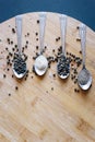 Various types of pepper on a wooden background Royalty Free Stock Photo